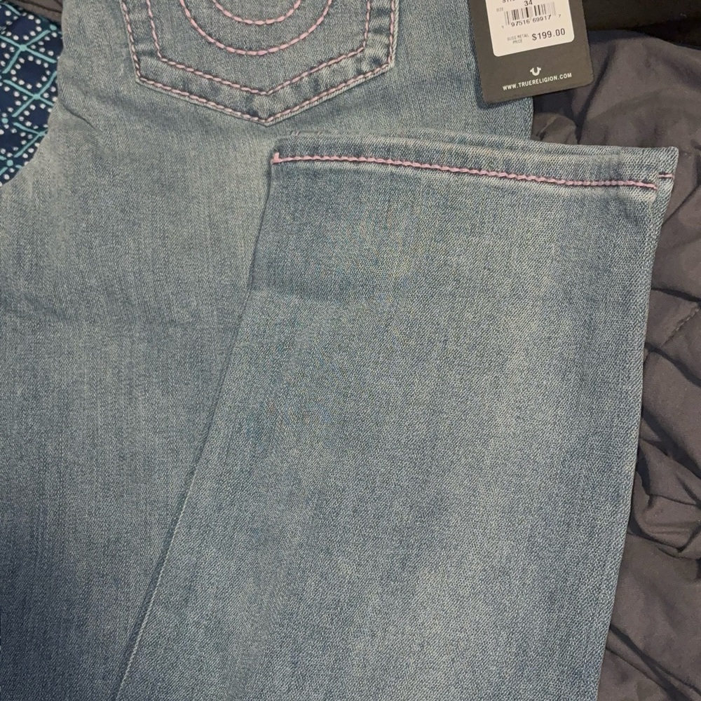 Light Blue True Religion Women's Jeans with Subtle Pink Stitching